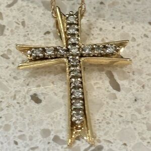 Elegant Gold and Silver Cross Pendant